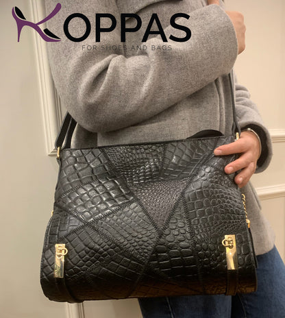 شنطة يد منصفة